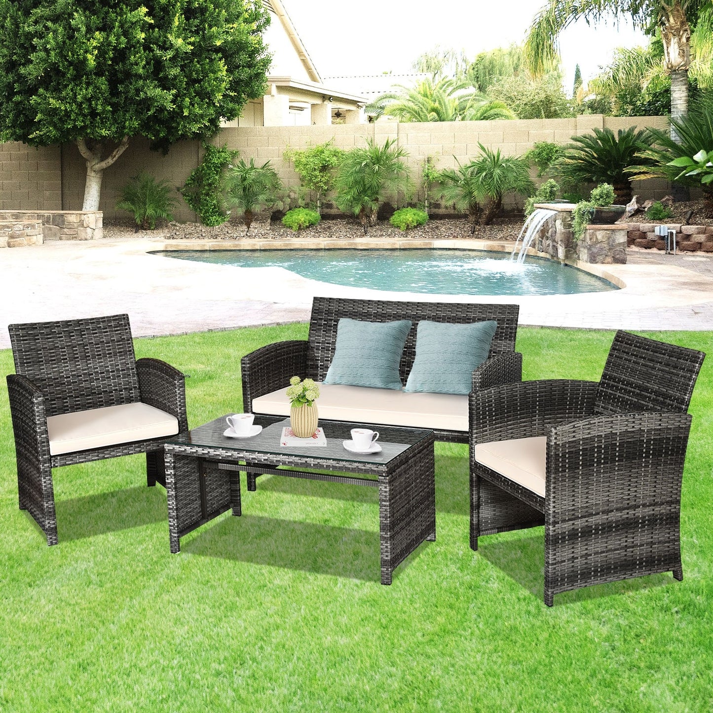 4 Piece Rattan Patio Furniture Set w/ Love Seat + Coffee Table + White Cushions.