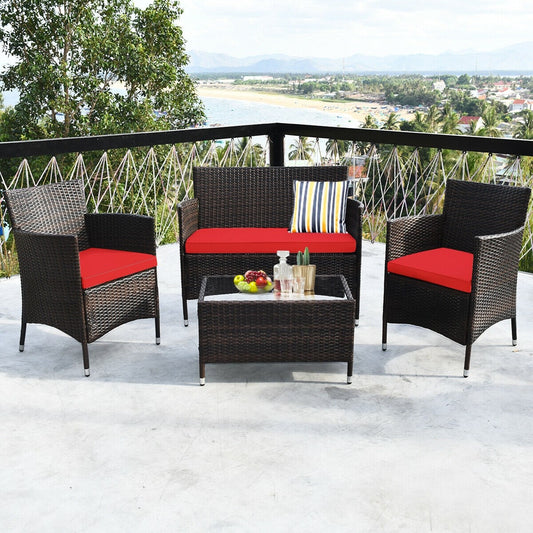 4 Piece Rattan Patio Furniture Set w/ Love Seat + Coffee Table + Red Cushions.